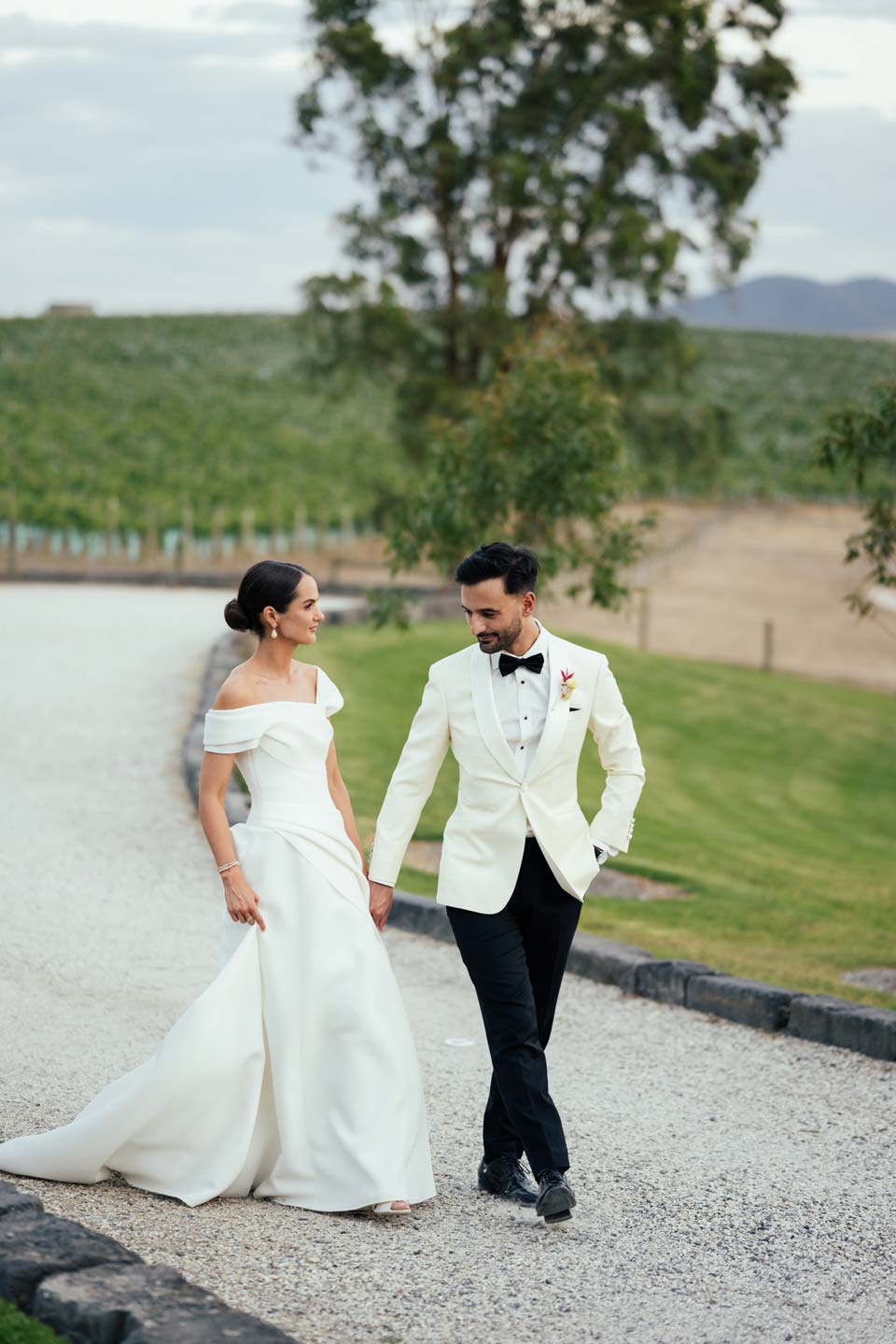 Zonzo Weddings Couple Behind Capella